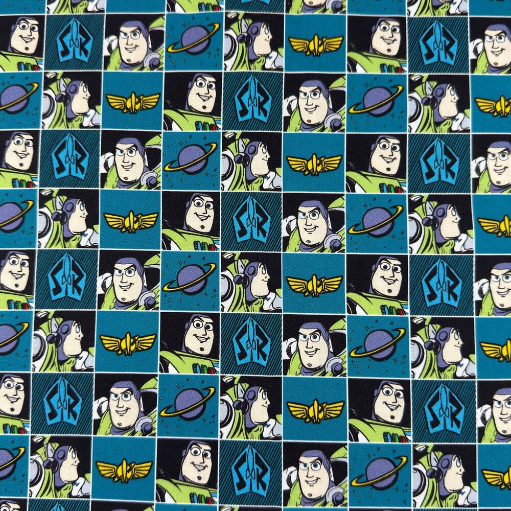 Disney Pixar Toy Story 3 Buzz Lightyear Block Print on Blue Fabric - 1/2 Yd